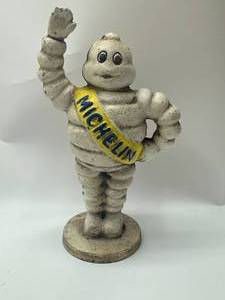 lot 47 image: Cast Iron Michelin (Heavy) 6 34 Tall