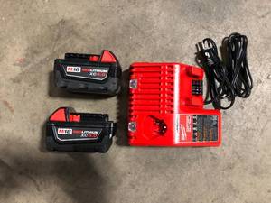 Milwaukee M18 18-Volt Lithium-Ion XC Starter Kit with Two 5.0Ah Batteries and Charger   Customer Returns See Pictures