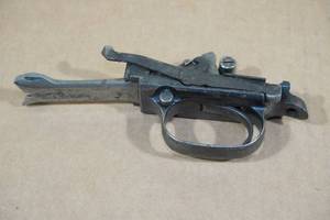 lot 27 image: Winchester Model 12 Shotgun Trigger Mechanism