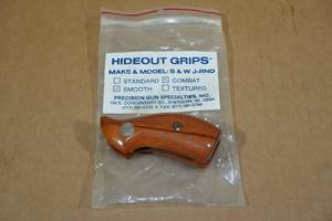 lot 31 image: Smith & Wesson Wood Revolver Grips