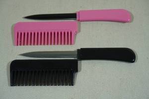 lot 82 image: 2 Hair Comb Knives