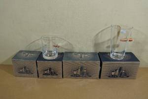 lot 146 image: Rocks and Pint Glasses with Embedded Bullets - 21st Amendment