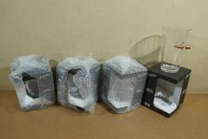 lot 150 image: Pint Glasses with Embedded Bullets