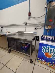 lot 60 image: Stainless Steel NSF Work Table on wheels