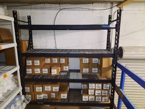 lot 92 image: Black storage rack with 4 ventilated shelves