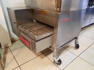 lot 29A image: Blodgett Gas Conveyor Oven MT1828 on oven stand with casters