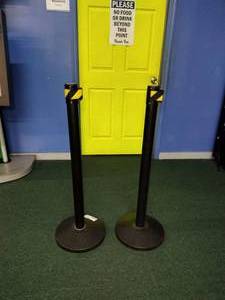 lot 125 image: 2  Black Crowd Control Stanchions, with retractable belt. 40 Tall.