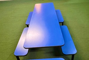 lot 53 image: Plymold 24 x 96 blue table top with blue seating.