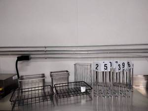 lot 172 image: (25) Restaurant supplies Wire baskets, Steam table pans, Stanchions