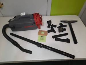 lot 186 image: Oreck XL Pro 5  Canister Bagged Vacuum with accessories.