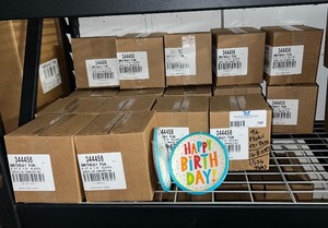 lot 198 image: 16 boxes with 12 8-packs of Creative Converting Happy Birthday 6.78 inch Plates per box. 1536 total plate count. PN 344456