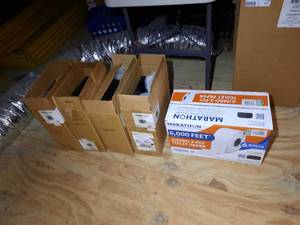 lot 252 image: (4) Carousel Toilet Paper Dispensers. Box of 6 rolls Jumbo 2-ply toilet paper.