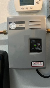 lot 87A image: Rheem Eco Sense wall mounted water heater model RETE-13