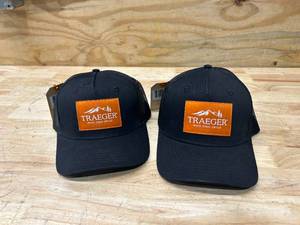 lot 76 image: TRAEGER Lot of 2 Snapback Hats