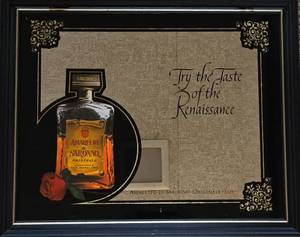 lot 64 image: Vintage DI SARONNO Amaretto Framed Bar Mirror