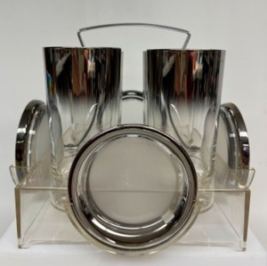 lot 89 image: Vintage MCM Barware DORTHY THORPE Silver Fade Ombre Highballs & Matching Coaster in Acrylic Rack