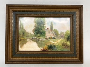 lot 132 image: Hand Painted Framed Porcelain Tile Small Cottage Scene Signed A.M.R. 1922.