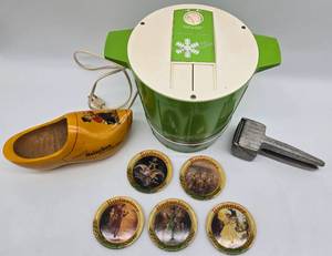 lot 276 image: Vintage Ice Crushers, Heineken Advertising Clog & 6 Budweiser Coasters