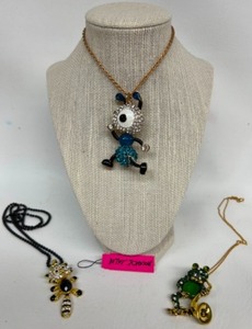 lot 198 image: Swarovski Crystal Characters Including A Betsy Johnson Ant, Racoon & Frog Playing the Saxaphone Necklace Pendants