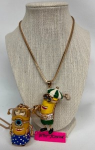 lot 199 image: Vintage BETSY JOHNSON Minons Large Character Necklaces Golfer & Little Girl