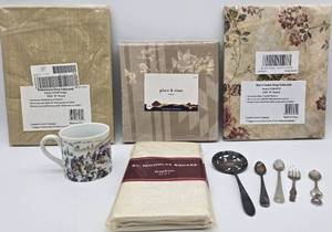 lot 285 image: 3 Vinyl Tablecloths, Napkins, Collectible Mug, & Flatware