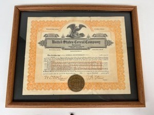 lot 396 image: Antique 1922 UNITED STATES CEREAL COMPANY Stock Certificate Framed