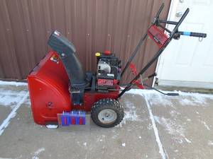 lot 100 image: MTD 522 snowblower with electric start. Used condition. Tested & starts. As shown.