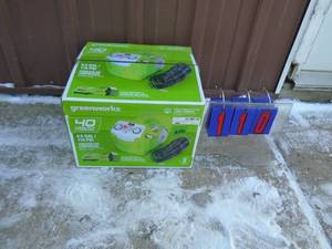 lot 110 image: Greenworks 40 volt cordless 12 gal air compressor with battery & charger. Like new but was used a few times. As shown.