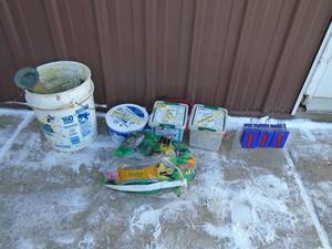 lot 111 image: Bunch of bird seed & feeders. As shown.