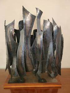 Modern Steel Sculpture on a wood base. 26 x 31 14