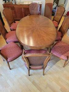 Vintage Henredon Dining set with 8 caned Dining Chairs  3 extra leaves and table pads.