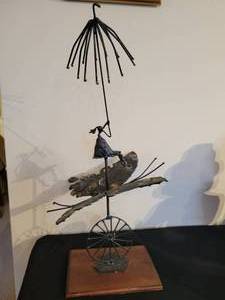 In Case of Rain. Whimsical metal sculpture by Claire Berg.