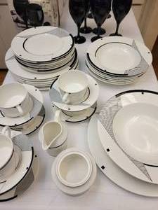 Angles by Christopher Smith China service for 6, paired with 24 pieces of Libby and Luminarc Stemware.