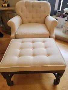 Button back Armchair with matching Footstool in off-white.