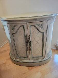 Oval shaped 2 door Cabinet-End Table.