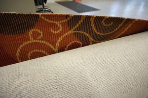 lot 1 image: 16 x 39 Approx. Carpet Remnant Color-Earth Tone Orange Brown