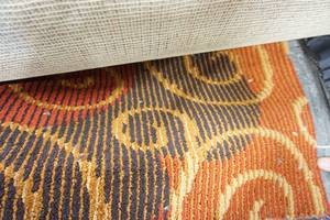 lot 16 image: 27-ft. Approx. Carpet Remnant Color Earth-Tone Orange Brown Damask Swirl Design