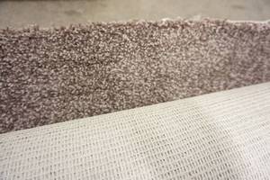 lot 81 image: 11-ft. Approx. Carpet Remnant Color-Tone Brown Mohawk Rootbeer