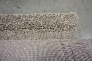 lot 86 image: 10-ft. Approx. Carpet Remnant Color-Tone Tan