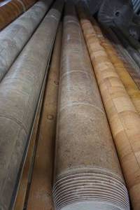 lot 169 image: HUGE Vinyl() Floor Covering Tan Cream Cotton Candy Blend 66ft and Wood Grain 24ft.