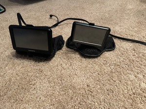 lot 26 image: Two Garmin GPS