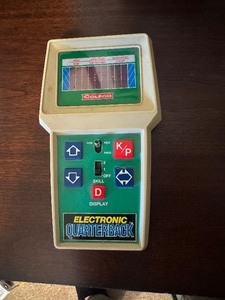 lot 29 image: Vintage Electronic Quarterback Game