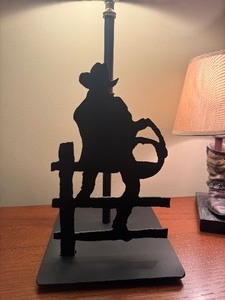 lot 53 image: Two Cowboy Lamps