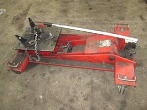 lot 25 image: Sunex 7752D Heavy Duty Low Profile Transmission Jack