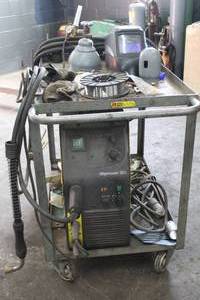 lot 20 image: ESAB Migmaster 203 Welder with Rolling Cart, Helmet and More (includes tank)