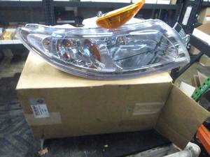 lot 165 image: International Head Light Assembly 3765680C94
