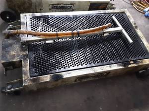 lot 88 image: Roughneck Oil Drain Dolly