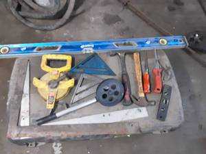 lot 107 image: Hammers, Speed Squares, Tape Measureswheel and SheetRock Knives