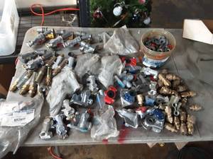 lot 259 image: Large lot of air brake fittings, swing away gladhands, seals, more
