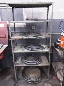 lot 357 image: Steel Shelf with Assortment of Rubber Hoses